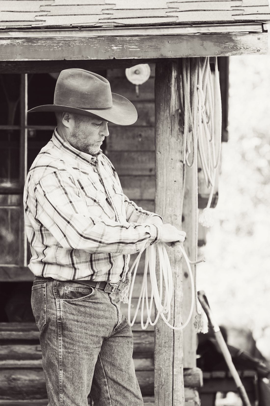 David Light, president of International Sporting Properties, on a ranch porch