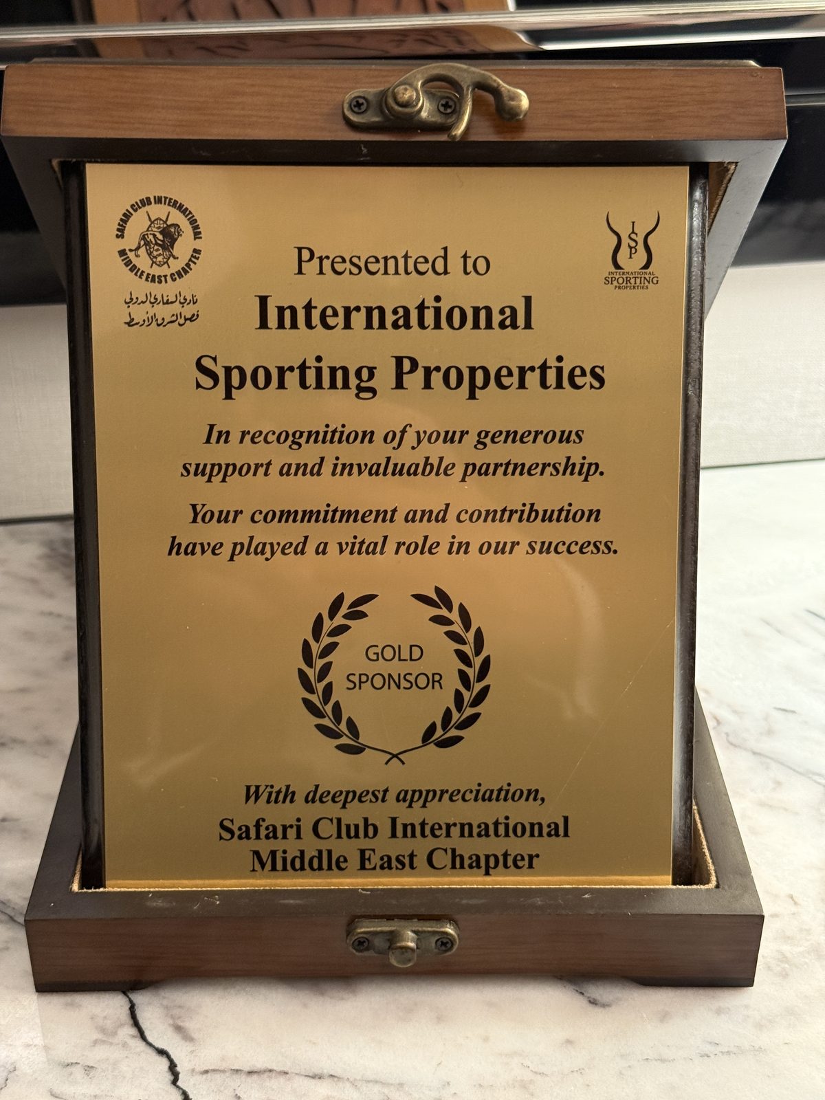 Gold Sponsor plaque presented to International Sporting Properties by the SCI Middle East Chapter